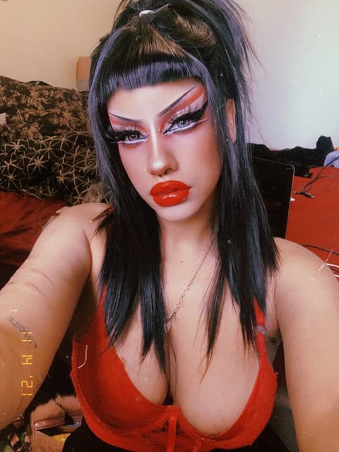Dahlia Versace, image 1 of 2