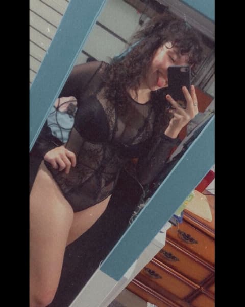Teal x, image 1 of 2